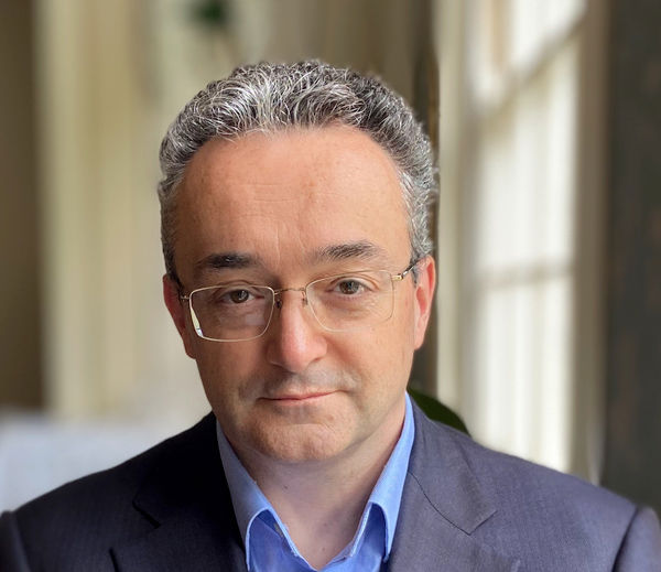 headshot photo of NCC Group's Chris Anley